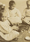 Kindergarten pupils with cat, hedgehog, and dog