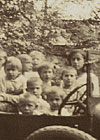 Kindergarten pupils in an automobile